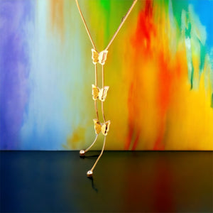 Stainless steel triple butterfly tassel necklace. Gold, fade resistant.
