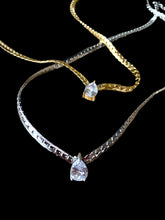 Stainless steel single CZ teardrop necklace. Gold or silver.