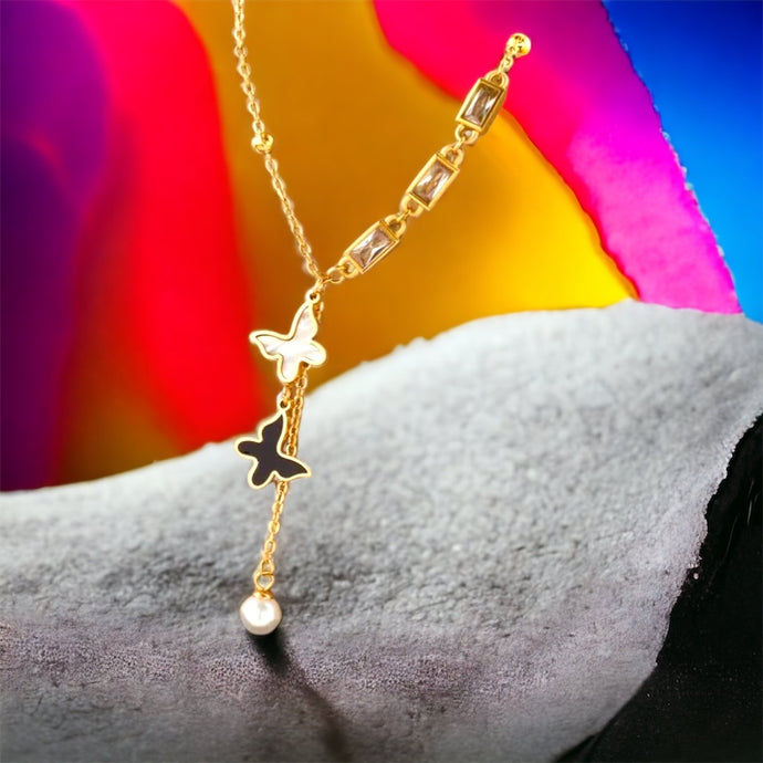 Stainless steel black & white enamel butterfly necklace. Gold, waterproof.