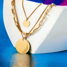 Stainless steel layered disc necklace. Gold, waterproof.