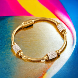 Stainless steel CZ flexible evening bracelet. Gold.