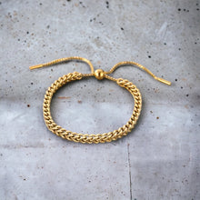 Stainless steel adjustable cinch bracelet.. Gold, waterproof.