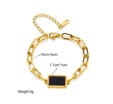Stainless steel geometric black bracelet. Gold, adjustable.