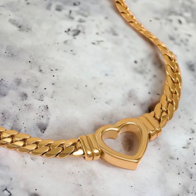 Stainless steel open heart curb necklace. Gold