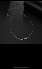 Stainless steel love arrow necklace. Gold, waterproof.