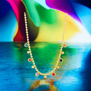 Stainless steel rainbow CZ necklace. Gold.