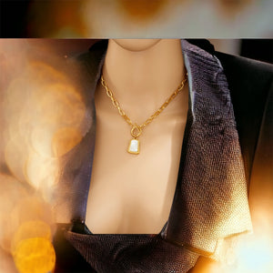Stainless steel natural shell tag necklace. Gold, waterproof.