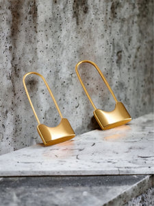 Stainless steel waterproof rectangular pin earrings. Gold