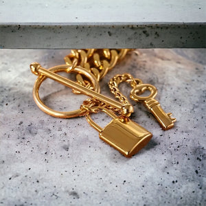 Stainless steel lock & key necklace. Gold, waterproof.