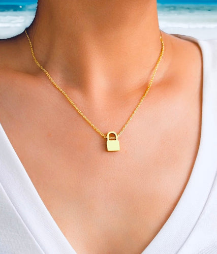 Stainless steel minimalist tiny 1cm lock necklace. Gold, waterproof.