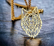 Stainless steel quirky open wolf head necklace. Gold, waterproof.