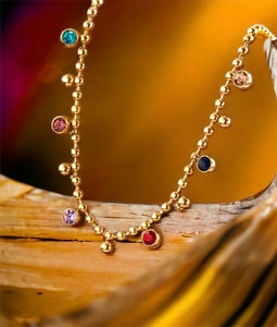 Stainless steel rainbow CZ necklace. Gold.