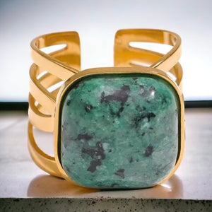 Stainless steel African turquoise square ring. Gold adjustable.