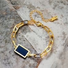 Stainless steel geometric black bracelet. Gold, adjustable.