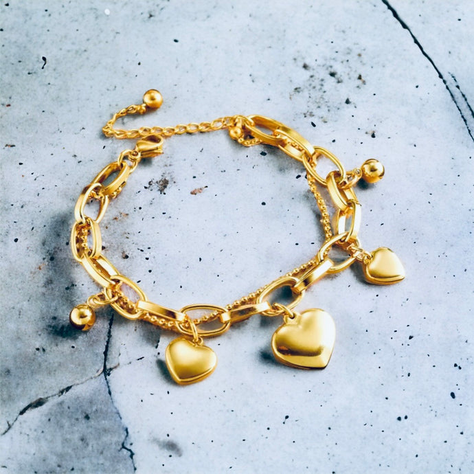 Stainless steel heart charm bracelet. Gold, Adjustable.