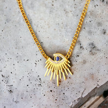 Stainless steel waterproof enamel eye necklace. Gold